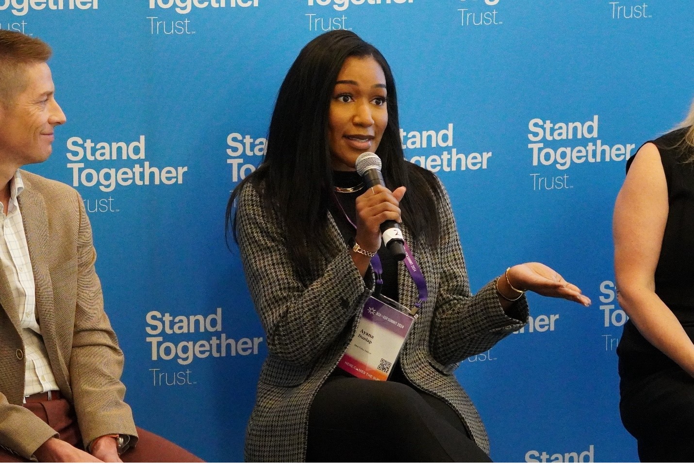 Ayana Dunlap speaks on a panel during a conference.