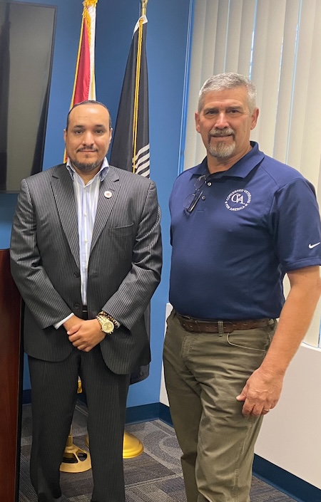 Leyva Edrys pictured alongside a Concerned Veterans for America official