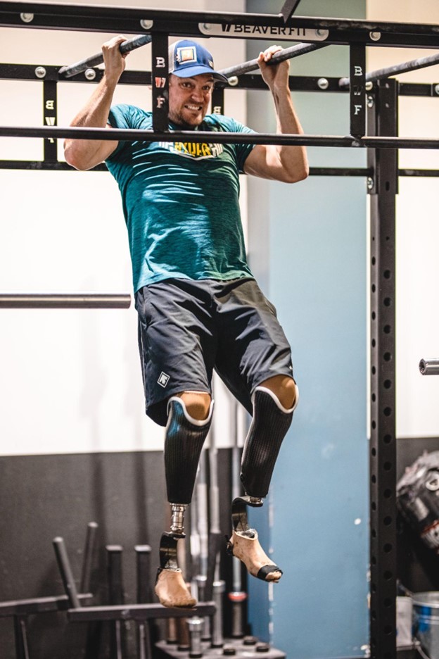 Tyler Turner does a pull-up during an ATF regimen. Courtesy of ATF.