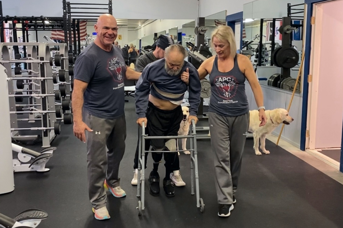 With Crouse and Pearson’s support, Don took his first steps with new prosthetic legs inside APC, first with a walker and then independently.