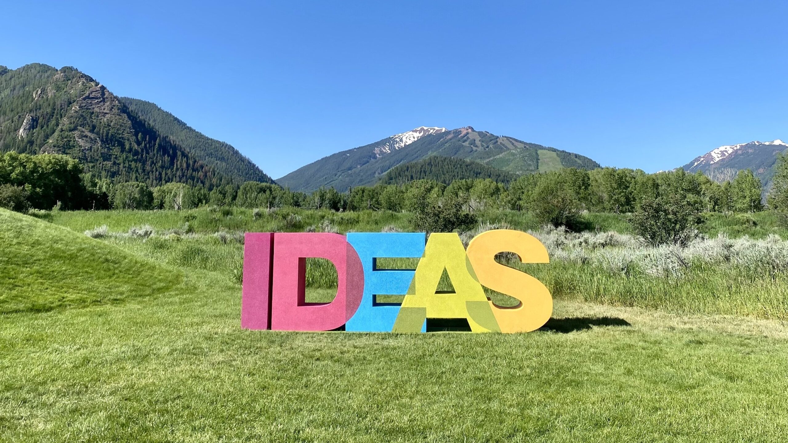 IDEAS text in a mountain setting