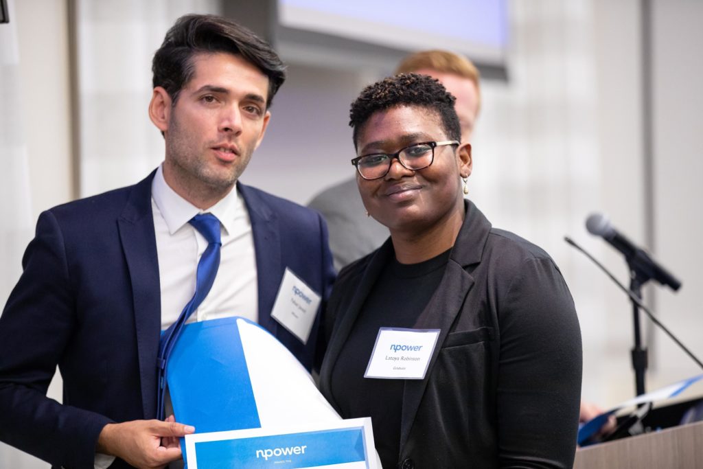 Latoya receives her certificate at the NPower Cybersecurity Fall 2018 graduation