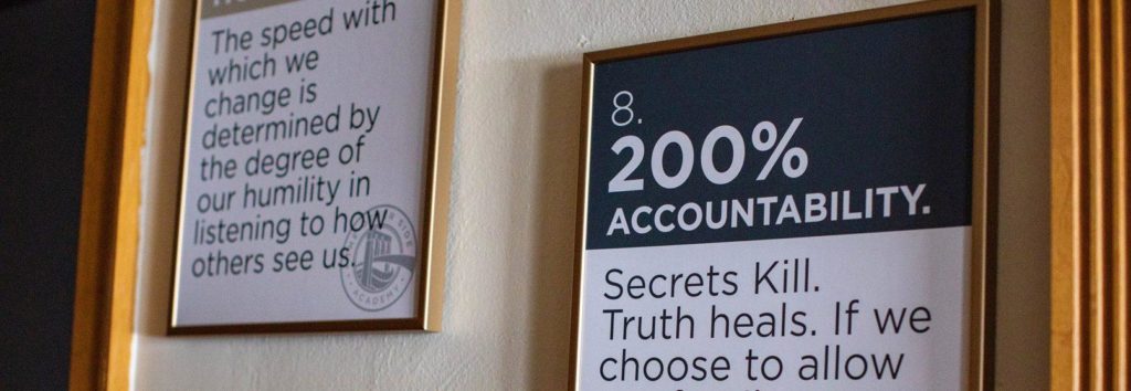 A sign about accountability on a wall