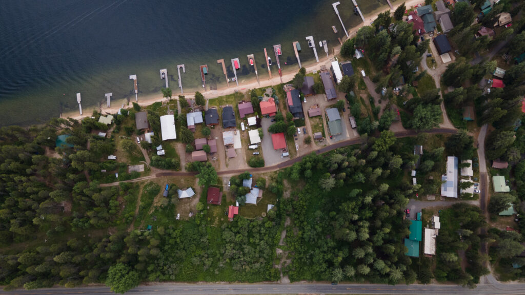 An overhead image of houses along the water