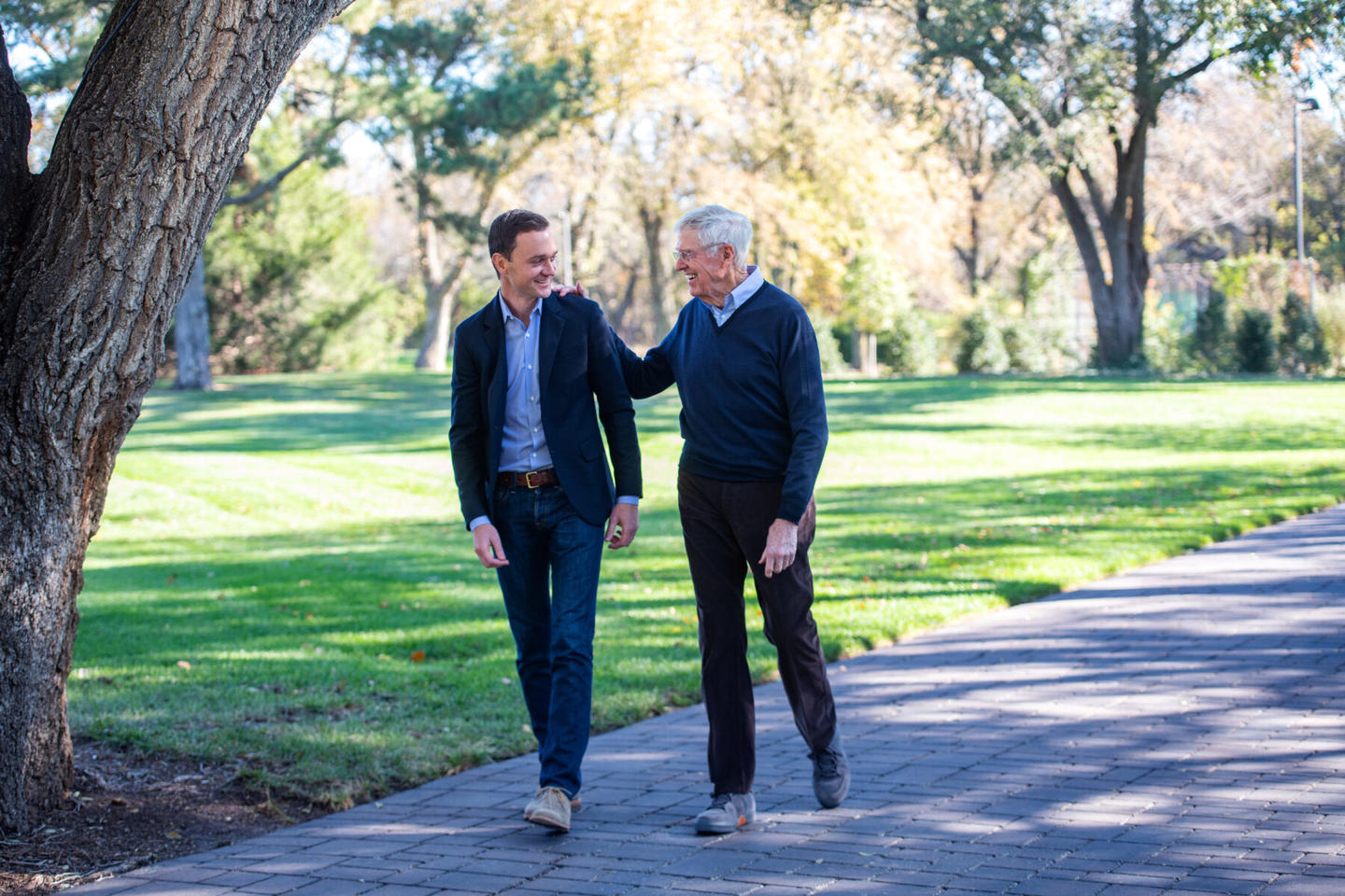 Charles Koch and Brian Hooks walking together