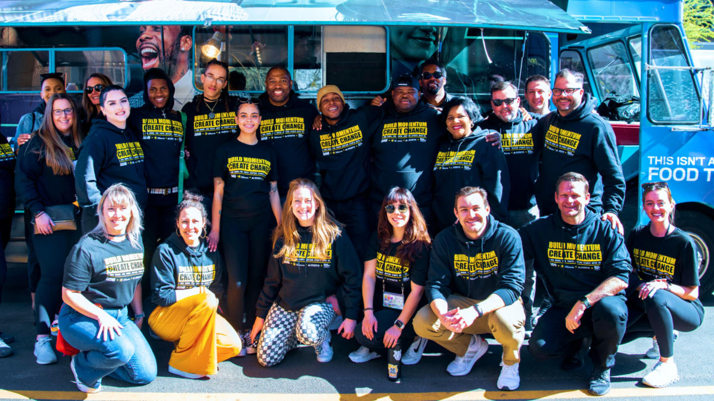 Cafe Momentum interns at a food truck