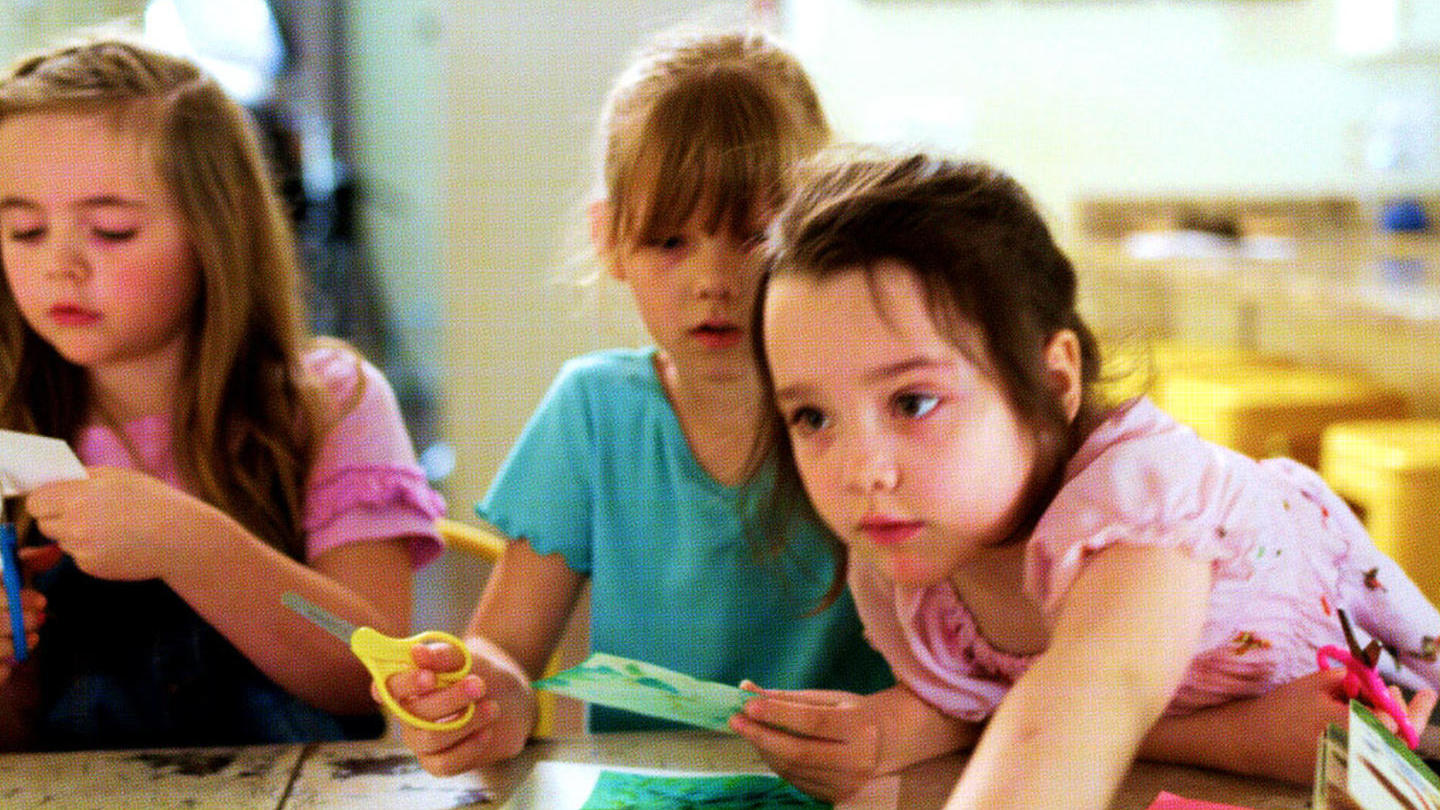 Two children engaged with their learning at a Prenda microschool.