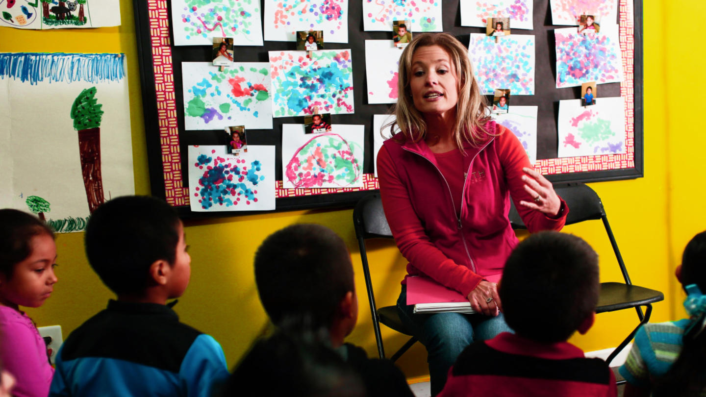 Path United founder Melinda Hollandsworth teaching a class with immigrant children.