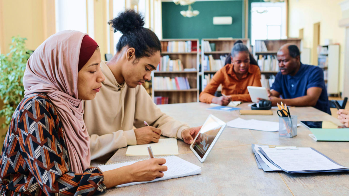 Refugees learning new job skills at an Upwardly Global program in America.