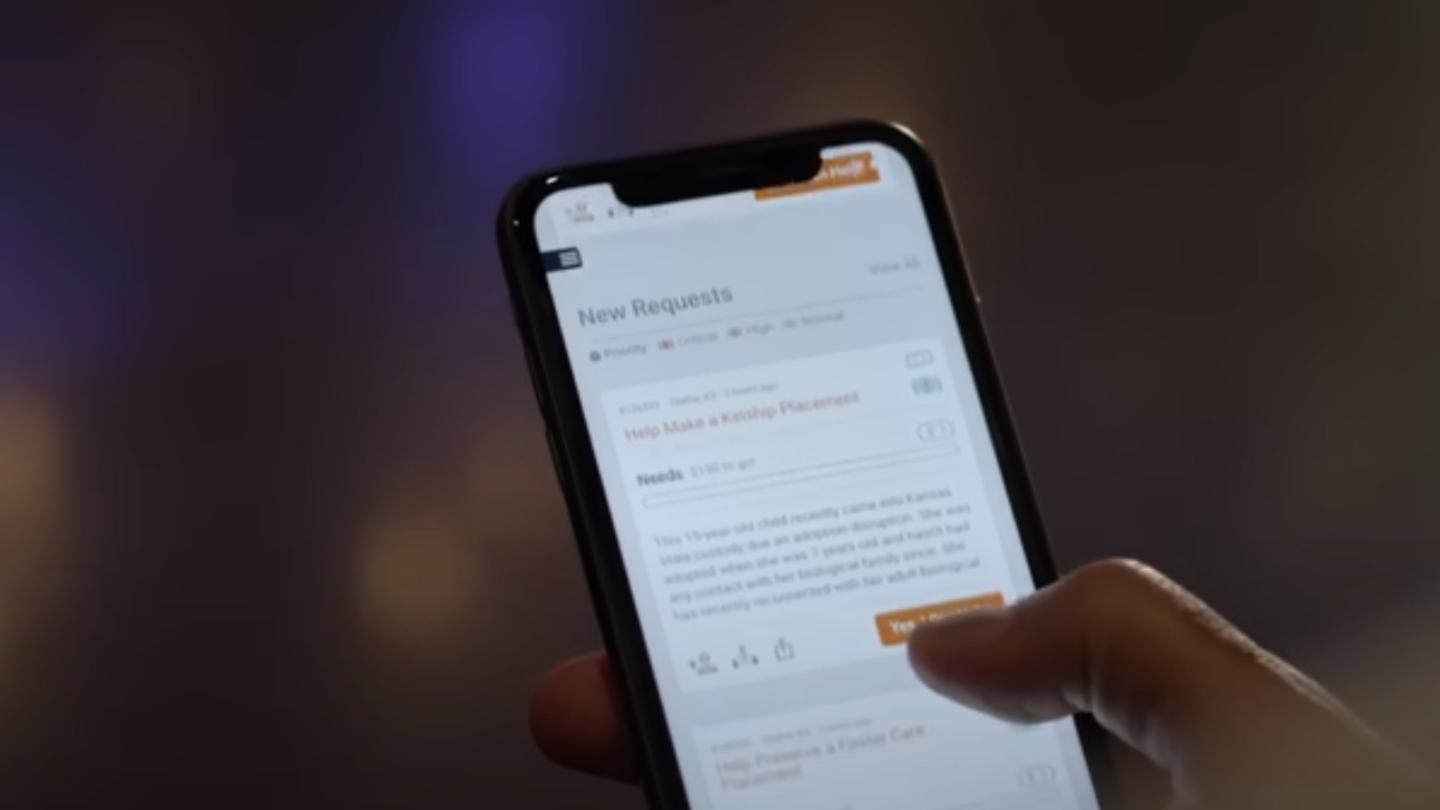 A person using the CarePortal app on their iPhone.