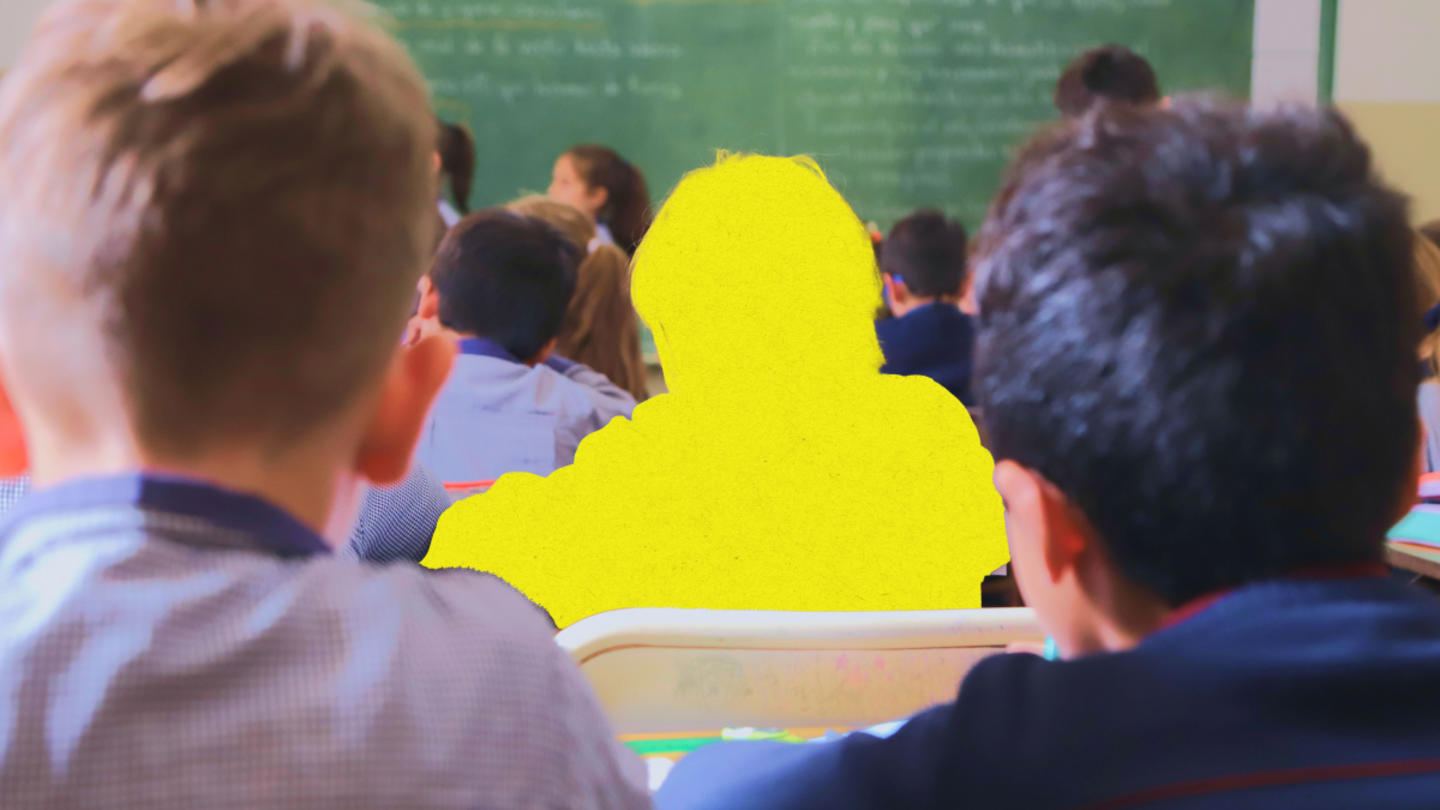Photo of a classroom with a student highlighted in yellow