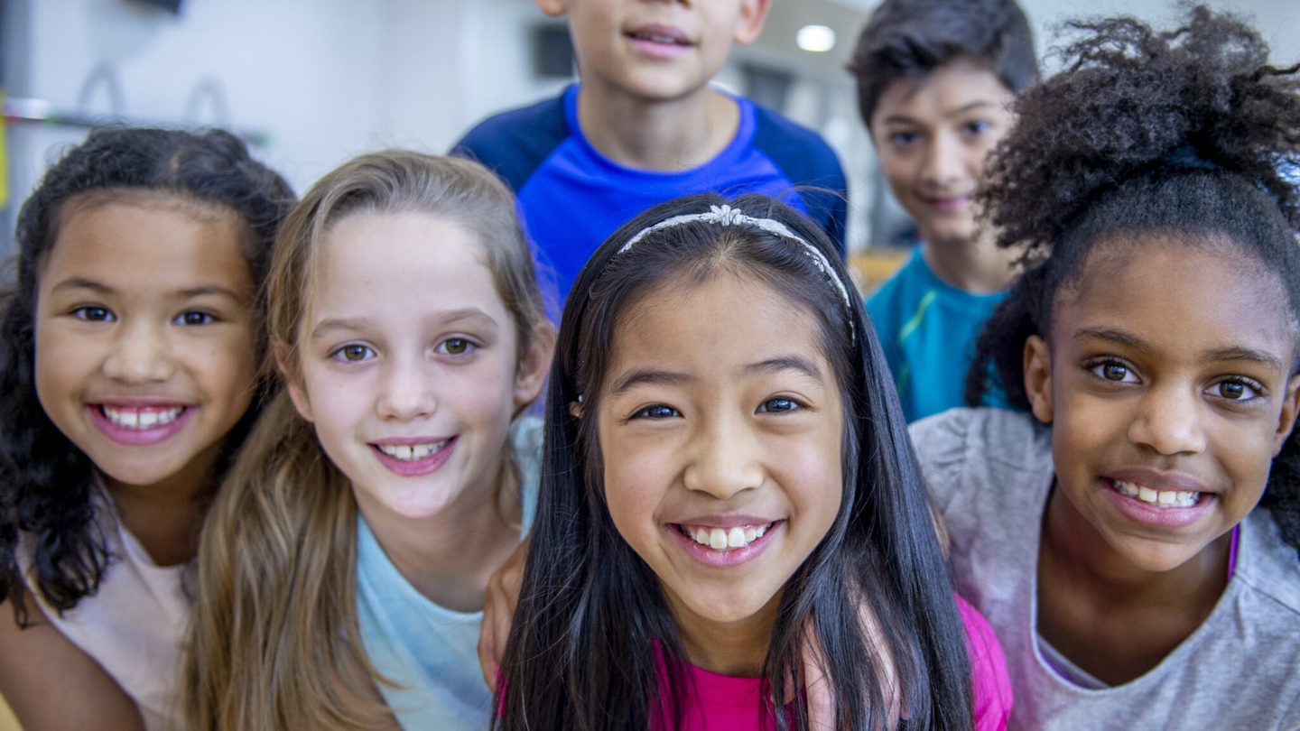 A group of students smiling for the camera