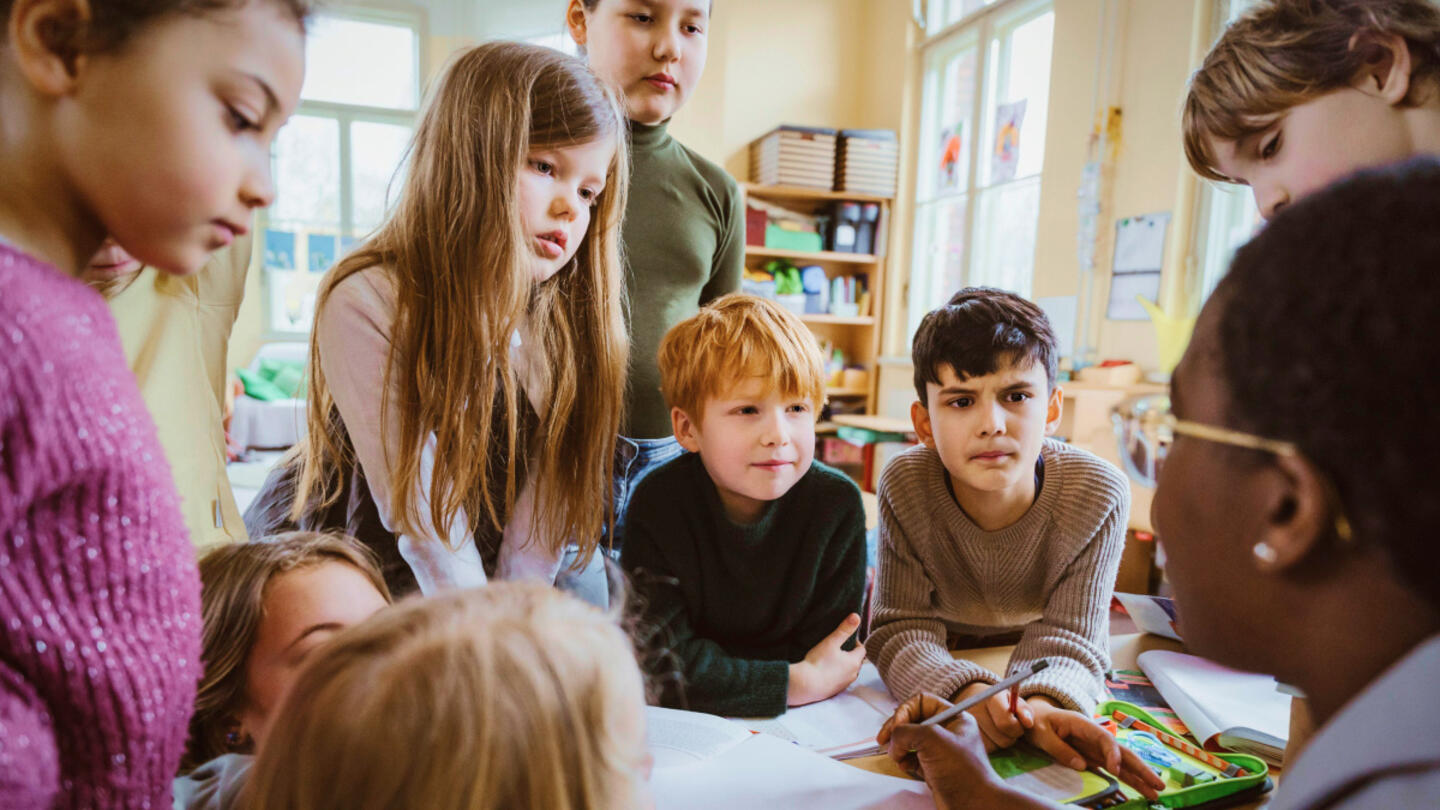 School children focusing on their teacher.