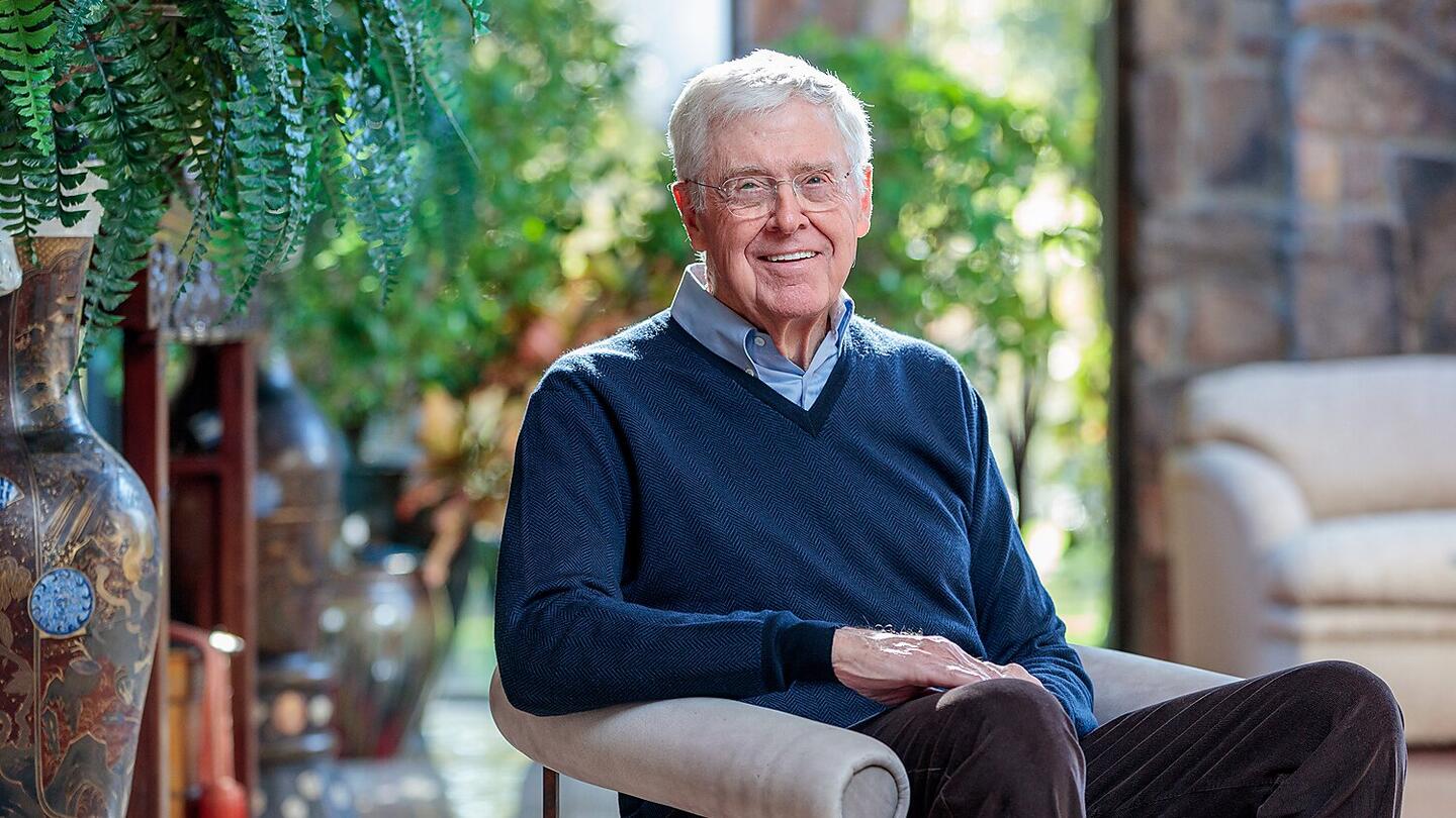 Stand Together founder Charles Koch sitting in a chair