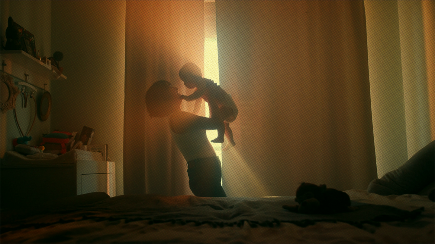 A mother holding her child.