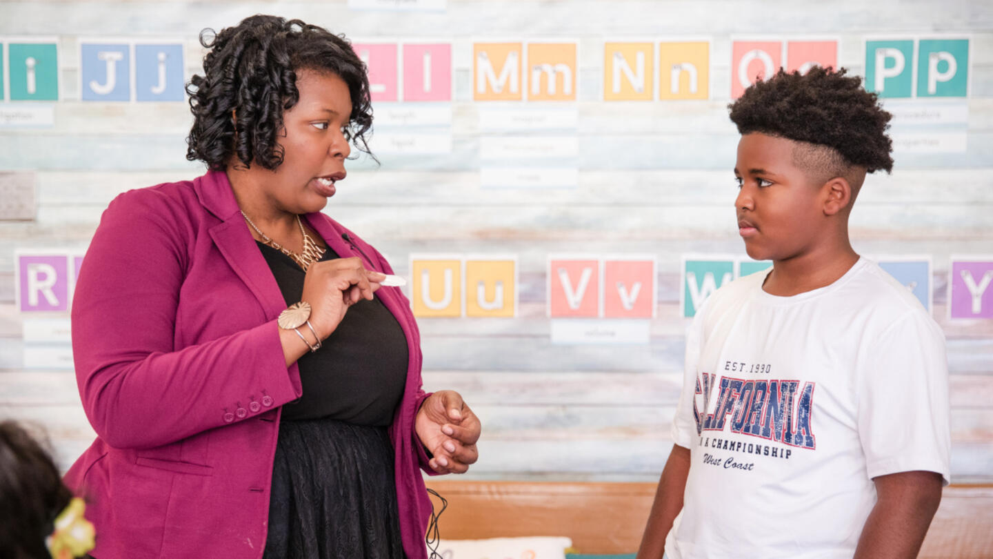 A teacher and student inside Creative Minds Microschool.