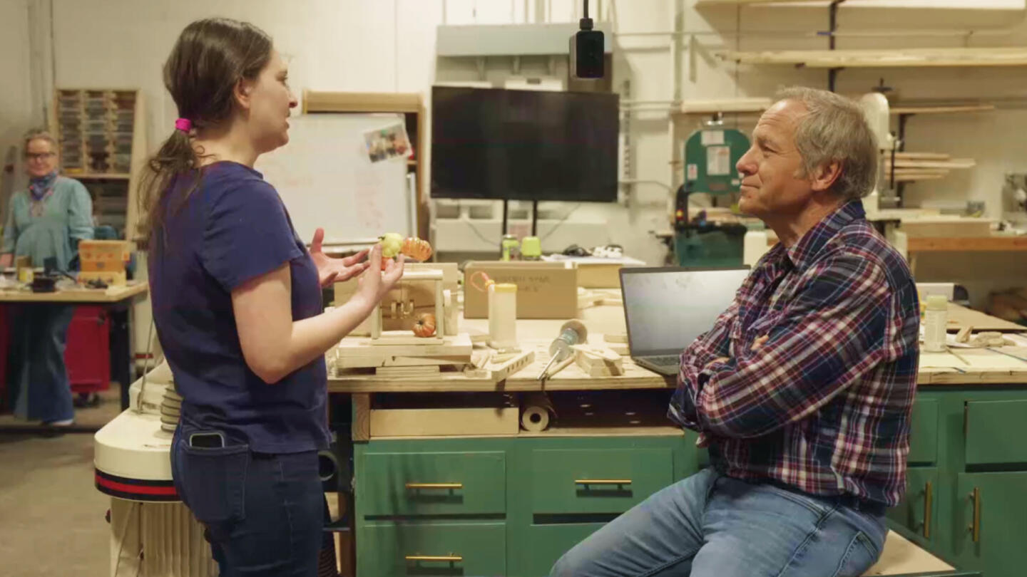 A woman talking about her job with Mike Rowe.
