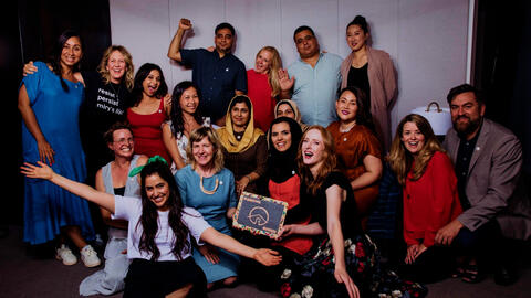 People from Miry's List take a group photo