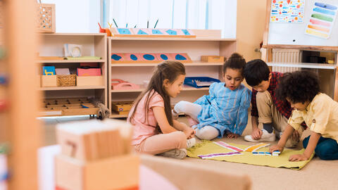 Students learn together in a classroom.