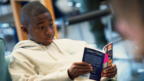 A student reads a book.
