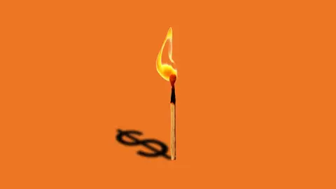 Match that has a dollar sign shadow.