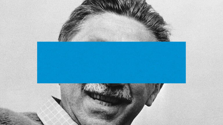 A photo of Abraham Maslow with a blue rectangle over his eyes