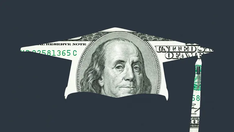 A $100 bill cut in the shape of a graduation cap