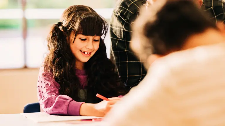 A student engages with her learning.