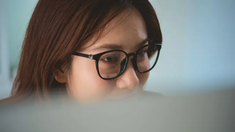 A woman with glasses.