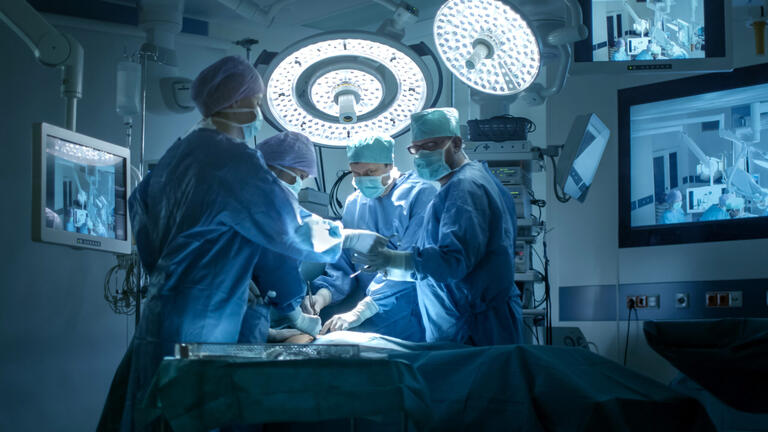 Surgeons in an operating theatre