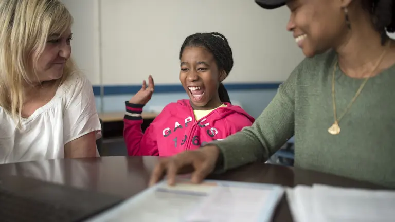 A child gets excited while learning