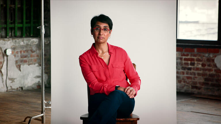 Irshad Anji sitting in a chair