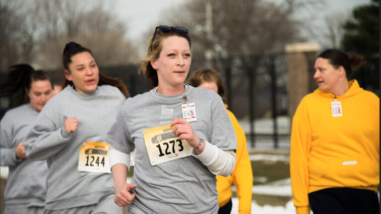 Female inmates running