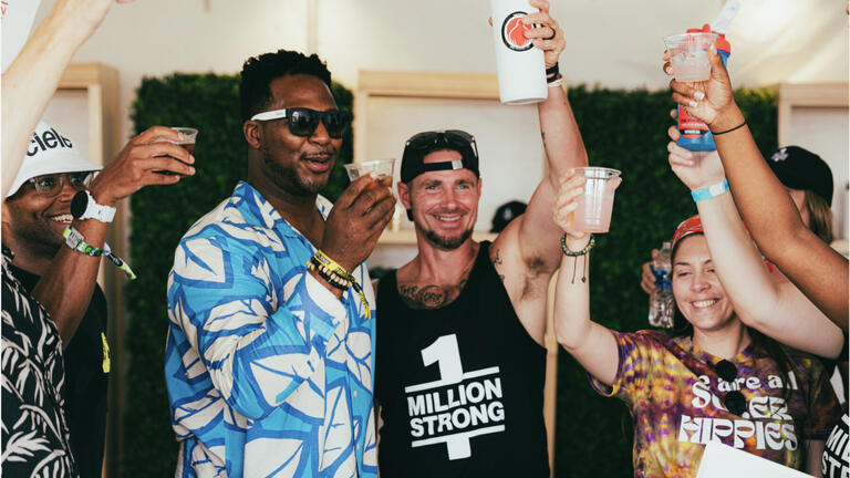 Group of people toasting with non-alcoholic drinks
