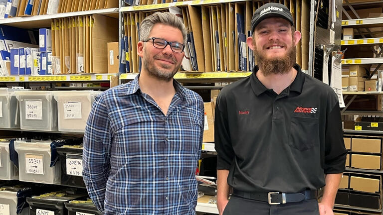 TACT Founder Danny Combs, and student, Noah pose for a photo