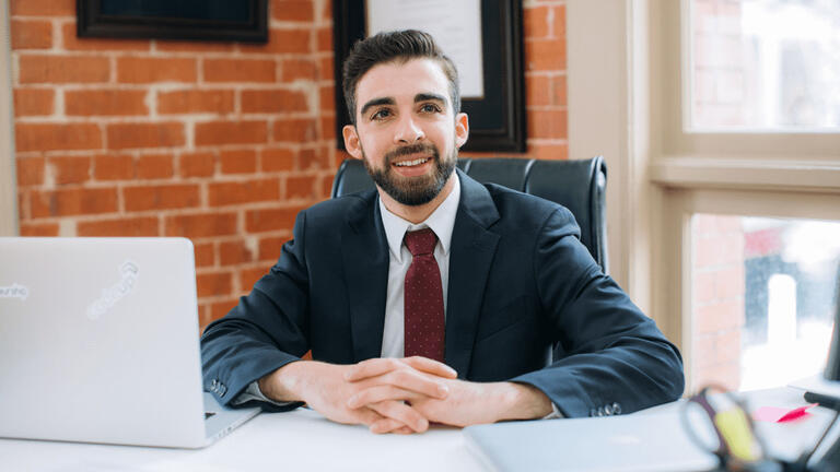 Man sitting at a desk