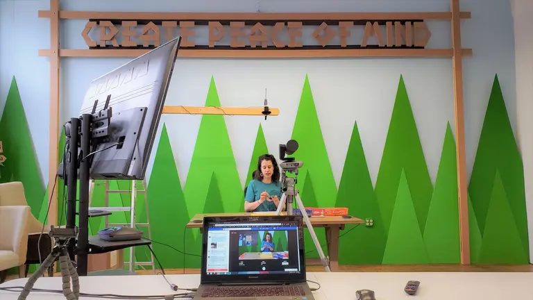 a woman in front of a camera