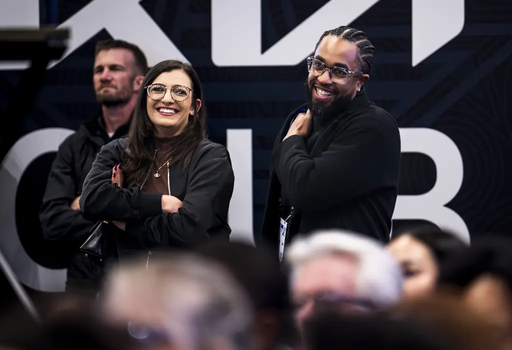 People smiling at the event.