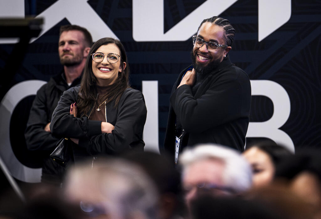 People smiling at the event.