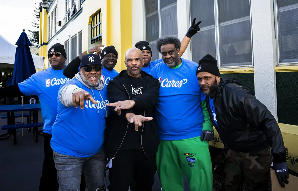 Darryl "DMC" McDaniels with a group of volunteers.