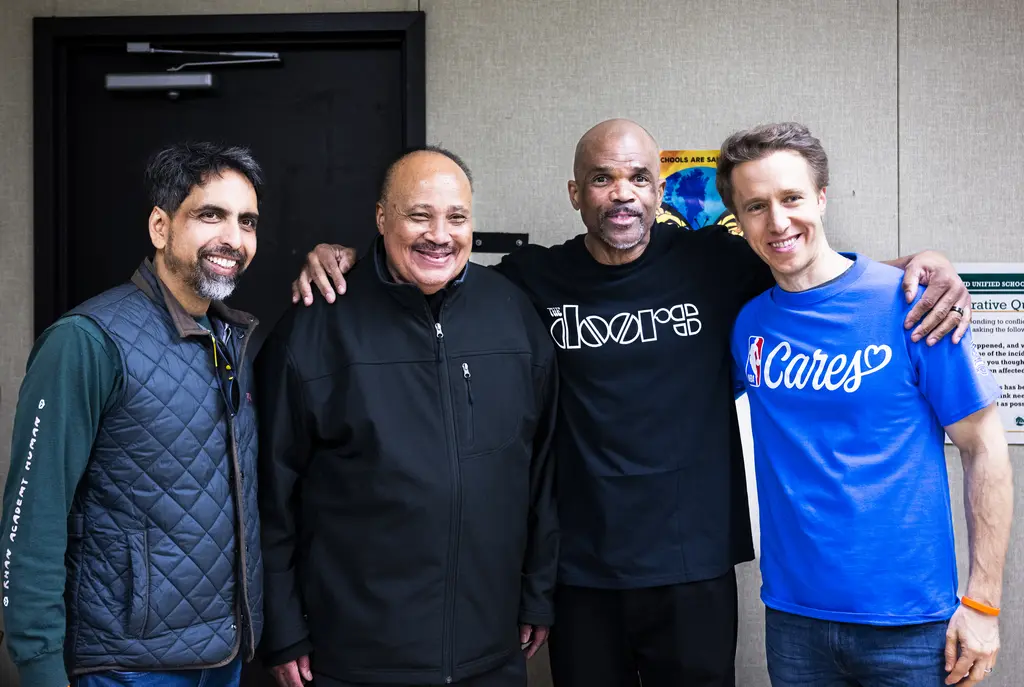 Group of men posing for a photo.