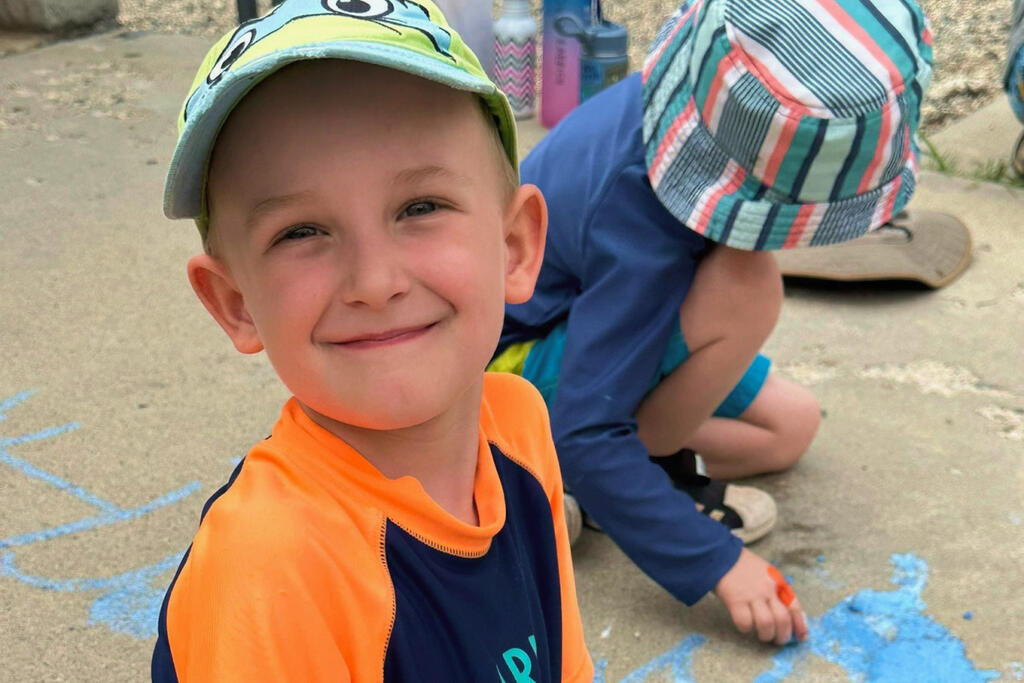 Owen Rabbich attends a hybrid school that blends school and home-based learning.