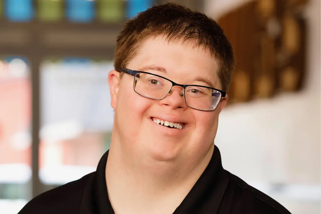 Jerry at his serving job at Hugs Cafe.
