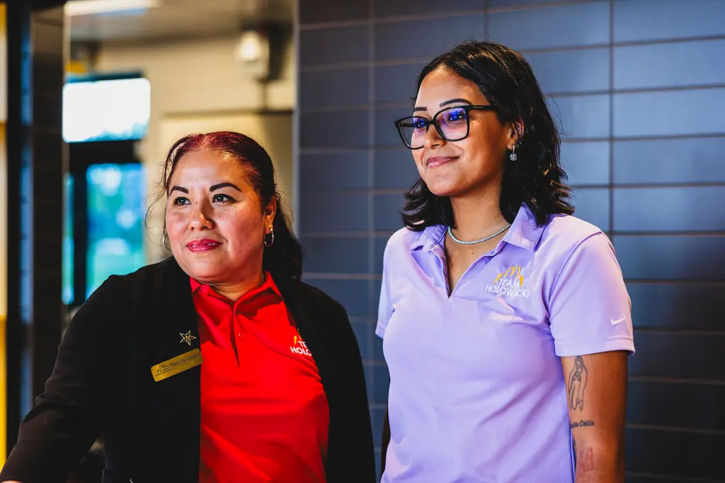 Anamaria Monterroso Jimenez, a marketing assistant for a McDonald’s franchisee in Columbus, Ohio, poses with her mother, Maricela Jimenez.