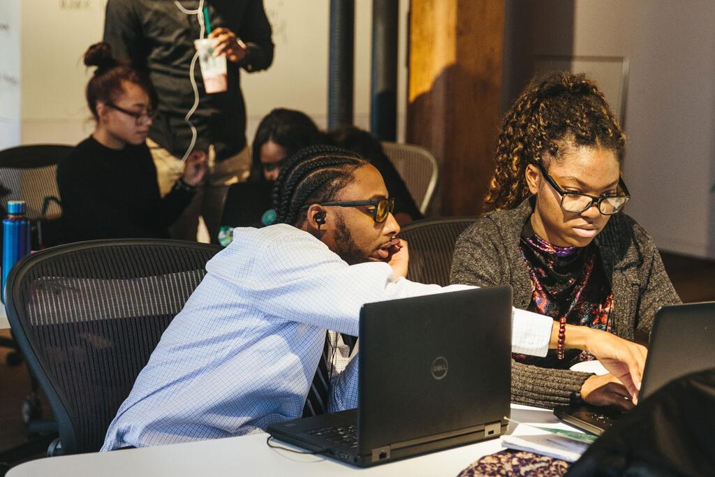 i.c.stars interns collaborating on an IT project