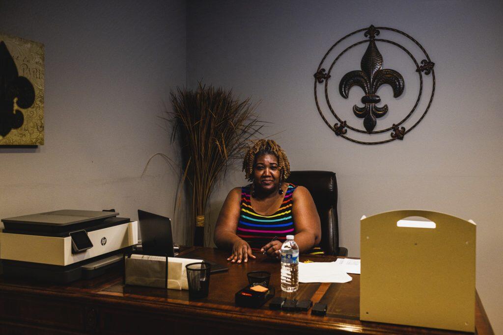 Ursula Newell Davis at desk