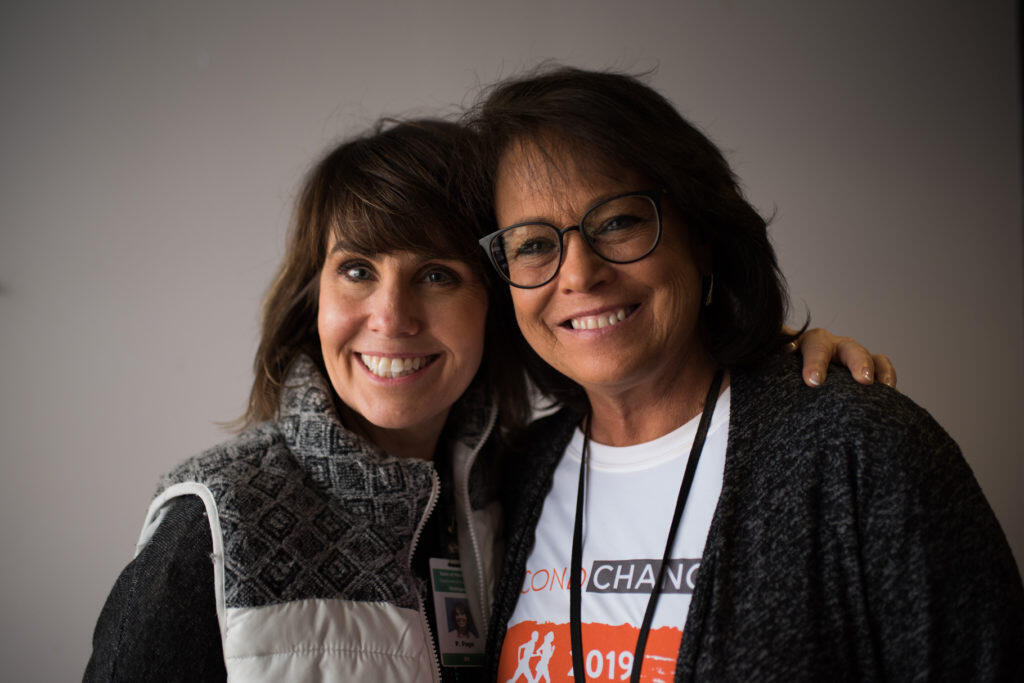 Pamela Page and Jeannine Hale pose for a photo