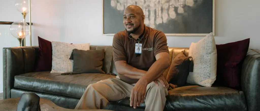 A man sitting on a couch