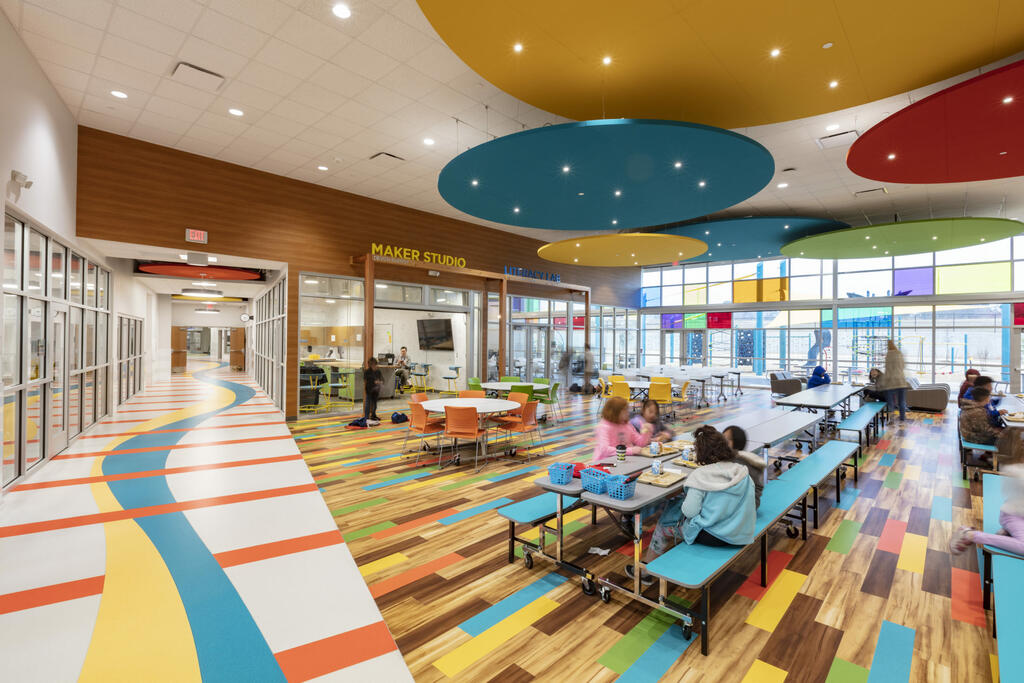 A cafeteria with students eating lunch