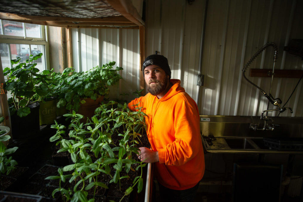 Patrick Bradshaw tending to plants